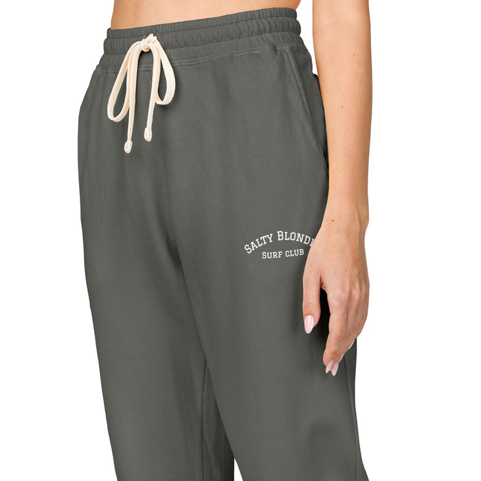 Gray sweatpants with a brand logo on a white background